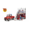 Estación bomberos y Land Rover Defender